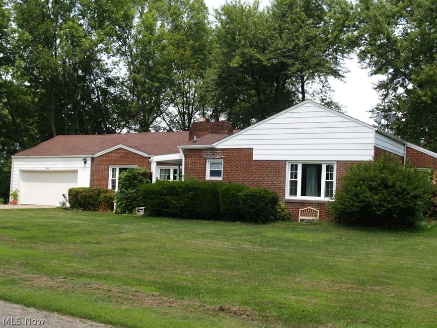 Sprawling Ranch home with lots of space on a lot of nearly one acre.  Huge living room with wood burning fireplace.  Formal Dining room, updated kitchen including, glass tile back splash, counter tops, flooring and fresh paint.  3 large bedrooms with lots of storage, 2 with direct access to bathrooms.  Many newer windows, updated baths.  Screened in porch will allow you to relax and watch the birds in your backyard.  Call for a showing today.