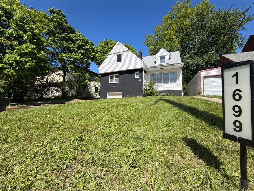 Completely reimagined with the guidance of a professional interior designer, this stunning South Euclid renovation blends warmth, functionality, and modern style in a way that simply feels different the moment you walk in. Beyond the curb appeal, the home opens into bright, flowing spaces designed for today’s flexible lifestyle — whether you need room for entertaining, working from home, multigenerational living, hobbies, or simply spreading out in comfort.

The showpiece kitchen anchors the home with quartz countertops, oversized double sink, custom cabinetry, updated lighting, stainless appliances, and an open layout that connects naturally to the living and dining spaces. Throughout the home, you’ll find thoughtfully selected finishes, warm wood accents, designer touches, updated flooring, and beautifully renovated bathrooms that feel straight out of a magazine.

A highly desirable first-floor primary suite offers convenience and flexibility, while the beautifully updated primary bath features a stunning sink vanity and spa-like feel. With 4 bedrooms, 3 full baths, a finished basement, and multiple bonus/flex spaces, the layout offers incredible versatility rarely found at this price point. The oversized upper-level spaces create endless possibilities for guest suites, office space, media rooms, playrooms, or private retreats.

Outside, the covered rear deck and backyard offer the perfect setup for relaxing summer evenings, entertaining guests, or simply enjoying a quiet morning coffee.

This is not a quick cosmetic flip — it’s a carefully curated renovation designed for real living. Photos are impressive, but the flow, scale, and feel of this home truly need to be experienced in person.