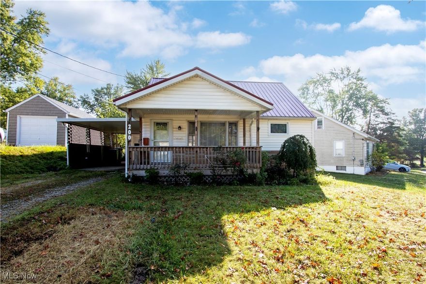 Charming home with great potential and priced very competitively to sell. The property includes a newer metal roof, garage, carport, and a welcoming front porch. The lot backs directly up to the park, offering both privacy and a scenic backdrop.  Inside, the home features a large living room, a main level bedroom and full bath, plus one large open room upstairs that could serve as a second bedroom, office, or flex space. This home is a great find in today’s market.