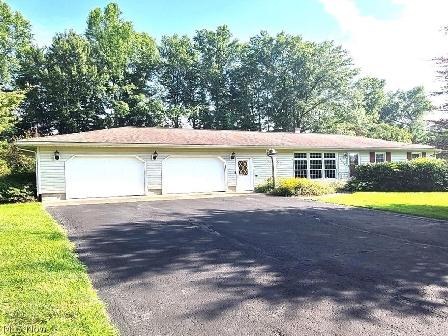 This cozy ranch style home has the conveniences of first-floor living. Come into the front door to the original living room, three bedrooms with hardwood floors, a spacious full bath, and a nice sized eat-in kitchen. The kitchen opens into an additional family room with sliders to a cement patio. There is a ground level laundry room with no basement stairs to climb. The oversized two car  attached garage is very large with gas heat and a sink with hot and cold water. Great for the hobbyist! Spencer Circle has very low automobile activity and not too far from all that Geneva has to offer.