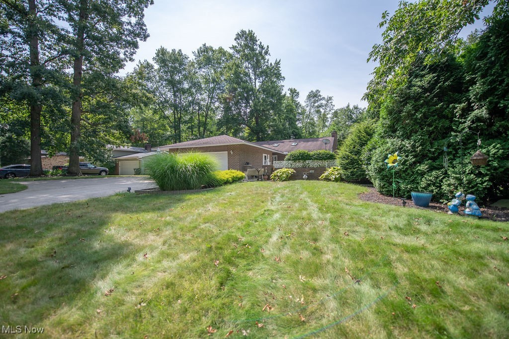 "Step into this meticulously maintained 4-level split home, conveniently located within the desirable Jackson Local School District! This residence harmoniously blends contemporary design with cozy living, featuring 3 bedrooms and 2 full bathrooms. Inside, appreciate the lofty, vaulted ceilings that flood the space with natural light, perfect for both unwinding and socializing. The spacious great room, adjacent to the living area, leads to a wonderful 4-season sunroom. This sunroom is excellent for unwinding, taking in the natural light, and enjoying views of the fenced-in backyard. Outdoor enjoyment is effortless with front and back patios, perfect for relaxing or hosting guests. The backyard also offers two sheds for added storage. Recent updates ensure worry-free living, including newer kitchen appliances and added heating and cooling in the garage—a perfect space for hobbies or projects. A newer water softener adds to the home's appeal, making this property a must-see for anyone seeking a blend of style and convenience. Don't miss out on this Jackson gem! Call today for a private viewing.