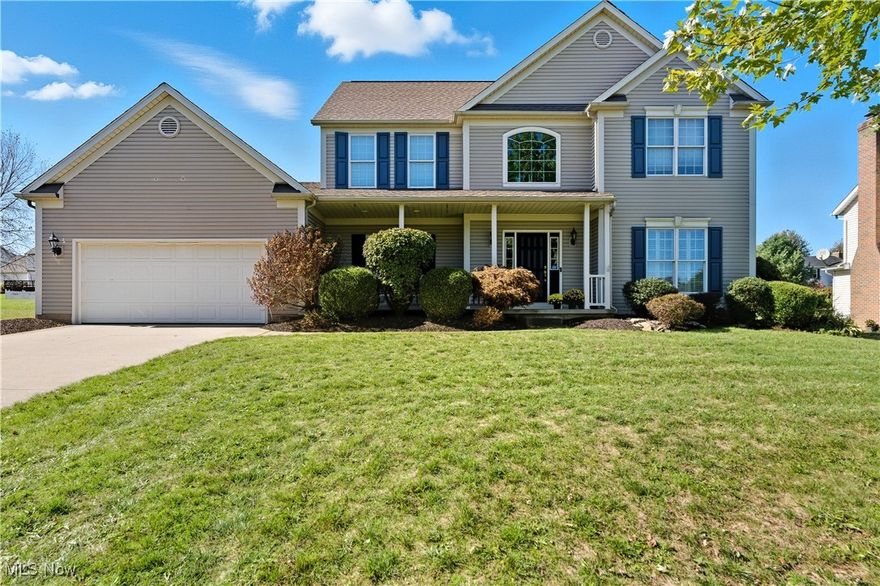 Welcome home to this beautifully maintained 4-bedroom, 3.5-bath home in The Boroughs, within North Canton City Schools! Step inside the impressive two-story foyer that leads to a spacious, open floor plan designed for both everyday living and entertaining. The formal dining room and library offer inviting spaces for gathering or quiet work-from-home moments, while the large family room features a gas fireplace, oak trim, and crown molding for timeless warmth and character. It is bright and airy, yet each space feels comfortably private. The kitchen is a true centerpiece, updated with quartz countertops, a classic subway tile backsplash, new light fixtures, and stainless-steel appliances. Ample counter space, two pantries, and a breakfast bar make it as functional as it is stylish. A convenient half bath and first-floor laundry with utility sink and cabinetry add to the thoughtful layout. Upstairs, the primary suite feels bright and spacious, featuring a walk-in shower, an oversized soaking tub, dual sinks, and a walk in closet. Three additional bedrooms and another full bath provide plenty of room for everyone. The finished basement adds valuable living space including a full bath, walk-in shower, and a large storage area. Outside, you’ll love the fenced-in backyard with a private deck, hot tub, stamped concrete patio, and motion lighting for safety. Additional highlights include a two-car oversized garage with a drain and electric. Check out this home with timeless details and modern updates in a welcoming North Canton community!