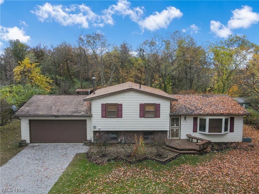 Welcome to this 3 bedroom, 1 bath, 2 car garage home sitting on more than 1.1 acres of land on a quiet, dead end street. The home has recently had new carpet installed in the living room, family room and most of the upstairs as well, the home has been painted, new fixtures and ceiling fans in many of the rooms have been installed and new gravel for the driveway was laid and compacted as well. The kitchen was updated in 2010 with Kraftmaid cabinets that include soft close drawers, beautiful hardwood flooring and is large enough to be an eat in kitchen. In addition there's formal dining room with hardwood floors that overlooks the wooded and secluded back yard. Enjoy the oversized back deck complete with plumbed gas grill and flower potting station as well. The home has plenty of room for storage in the closets, the very large crawl space and multiple storage sheds in the back yard. Looking for a home that's been lovingly taken care of, look no further! The seller is offering a home warranty from Old Republic at no charge to the buyer for peace of mind! With so much to offer, all that's left is to move in! Welcome home!