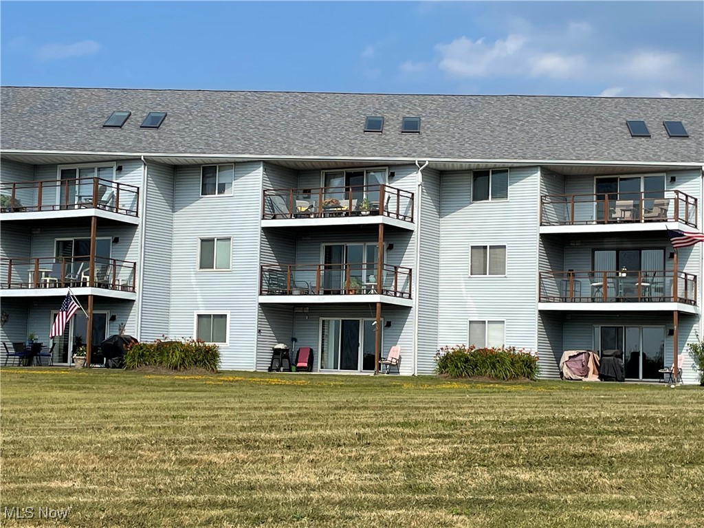 Welcome to this spacious and stunning 2-bedroom, 2-bath, (with an oversized loft) condo located on the second floor overlooking the Historic Conneaut Harbor on the shores of beautiful Lake Erie. This condo is move in ready with many updates completed in the last two years. Enjoy the recently painted open floor plan that flows from the updated kitchen and breakfast bar to the dining area and opens to breath taking living room views of Lake Erie. The living room has vaulted ceilings and sky lights to allow an abundance of natural light. The updated kitchen has new smart appliances included, new quartz counter tops, and new kitchen cabinets. There is also new flooring throughout the main living area, bathroom, and bedrooms. Master bedroom has an updated private bath with new shower doors, spacious walk-in closet and outstanding views of the lake. The second bedroom has a nice sized closet with new paint and flooring. The second bathroom has been remodeled with new walk-in shower with ceramic tile, rain shower head, and new sink and cabinet. The home also boasts all new unique light fixtures with fans. If you are worried about storage this condo has you covered with its laundry room/office space if needed. Turn the upstairs loft with new carpet into an entertainment room, extra bedroom, or personal home office. This space also has hook ups for a possible 3rd bathroom, if needed. This condo has a 1-car detached garage that is great for storage and a perfect place for all your toys. If you're looking to live the lake life this is the place for you! With fishing, boating, swimming, beaches, parks, and some of the best restaurants with live music and year-round entertainment this condo has a lot to offer!!