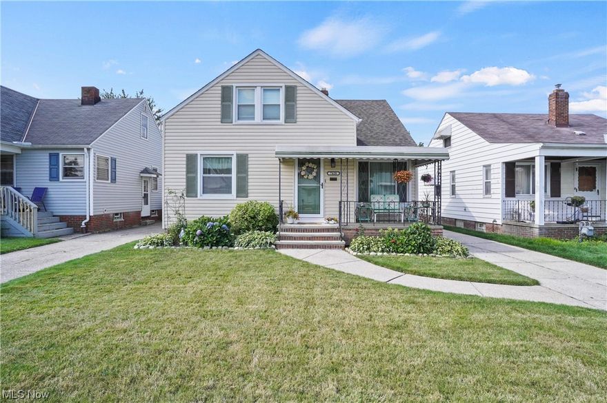 Charming Cape in lovely neighborhood of neatly manicured homes conveniently located  within close proximity to shopping and highways. The first floor living room, dining area and kitchen are clean and open and  bright with neutral decor throughout. Kitchen appliance are 2 years old.  The first floor has two bedrooms and a nicely remodeled first floor bathroom. There are hardwood floors in most of the rooms. The second floor is one large bedroom with new carpet and a walk in closet. The basement has a recently updated  large rec room with canned lights . This house is a real gem as it has been very well maintained with newer roof, siding, furnace, windows, water heater and more. Plus a two car garage!  Home warranty included. Don't hesitate to see this one!