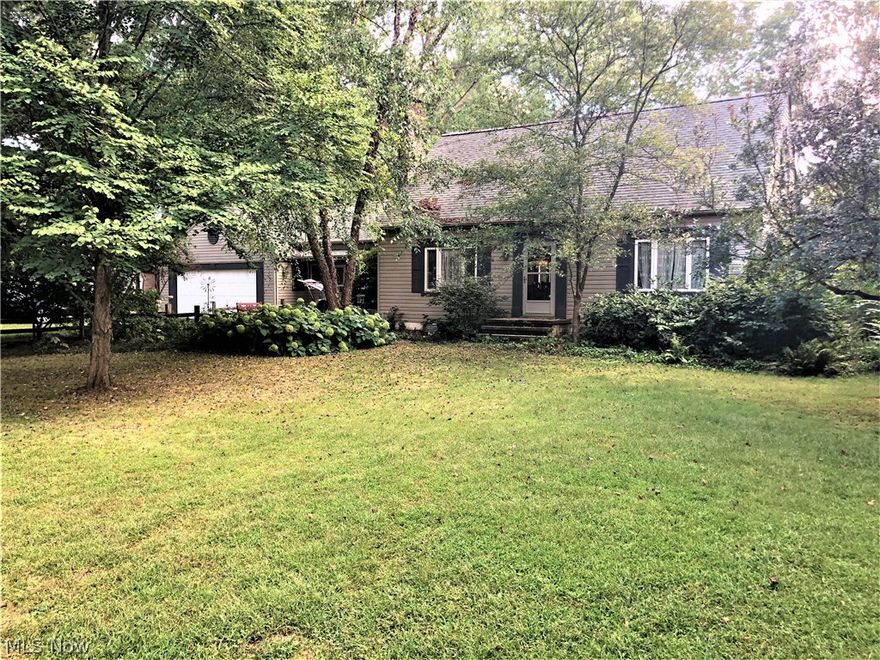 Welcome to 2980 Pontius St NW in Uniontown, OH in Stark County.  Lake Township School District.  Warm country atmosphere with plenty of mature trees and overflowing gardens at different seasons.  Beautiful foliage in the Fall.  Large master bedroom is entire second floor with double closets and large built-in drawers, storage closets and attached 2 car garage.  Approximately one acre of the property is fenced in behind the house for privacy and/or pets and includes an in-ground pool that sits further back from the house, pool shed with equipment and change room/storage and an additional 2 1/2 car updated workshop with built-in shelving, electricity and pellet-burning stove.  Remaining acreage is wooded and runs down to the Tuscarawas River.  Many updates.  Schedule your private showing today.