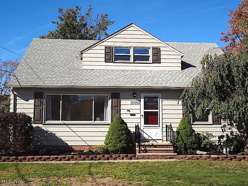 This Home has just what you have been looking for - Granite Counter Tops, Updated Full Bathrooms, Hardwood Floors, Open Spaces with Updates Throughout! From the freshly painted Exterior with Covered Deck, Large Yard and 2 Car Garage to the Amazing Updated Interior you will know you found your new home! The Beautiful Hardwood Floors Accent the Bright Living Room and flow down the hallway to the 1st Floor Bedrooms. The Kitchen is a show stopper with SS Appliances, White Cabinetry and Granite Counter tops with Dining Area that has Slider to Oversized Covered Deck. The Spacious Master Bedroom has a ton of built ins and closet space to spoil you! The Basement is an added bonus with Great entertaining spaces - Huge Rec Room with Bar, Extra Kitchen set up with Microwave, Refrigerator and gas line for Stove and a Brand New Tiled Full Bathroom! Glass Block, Newer Windows, Roof and Electric!