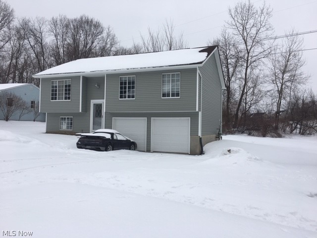 Just Finished with complete Remodel! New 2019 Vinyl Siding, Gutters and Downs, Garage Doors with Openers, Back Deck, Storm Door, Exterior lighting, New Stainless Steel Appliances, Luxury Vinyl Plank Flooring (Kitchen, Both Baths, Entry Way, Laundry Room). New Carpet throughout remaining rooms, Fresh paint, interior lighting, New Furnace and Central Air, Hot Water Tank, Bathrooms. This home is located in a quite neighborhood with sidewalks with easy access to highway. Schedule your showing today! Home Inspection has already been preformed and available with any offers.