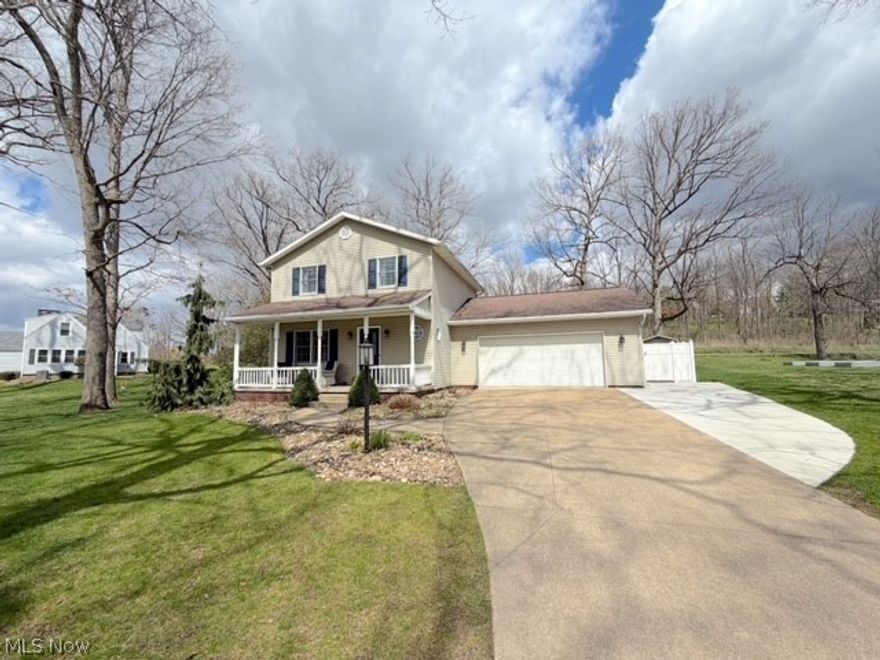 This beautifully remodeled 2-story home is tucked away on a .47-acre lot at the end of a quiet cul-de-sac street. It has 3 bedrooms, 2 1/2 baths, and a thoughtfully updated modern interior perfect for everyday living and entertaining. The spacious living room has a gas fireplace. The kitchen has Schrock cabinetry, a breakfast bar, and includes all of the appliances. The dining room has patio doors that lead out to your own private retreat with a heated in-ground pool and an incredible covered poolside patio with barn doors that open up to a fire pit and private yard. Upstairs are the 3 bedrooms and a large, remodeled bath with a soaking tub and separate shower. The master suite has a walk-in closet and a private door into the bathroom. The finished lower level provides additional space for a family room, home office, full bath, and lots of storage. The 2-car attached garage is insulated, has a RV plug, and is wired for a generator.  This home is move-in ready in a desirable peaceful setting, with standout amenities!