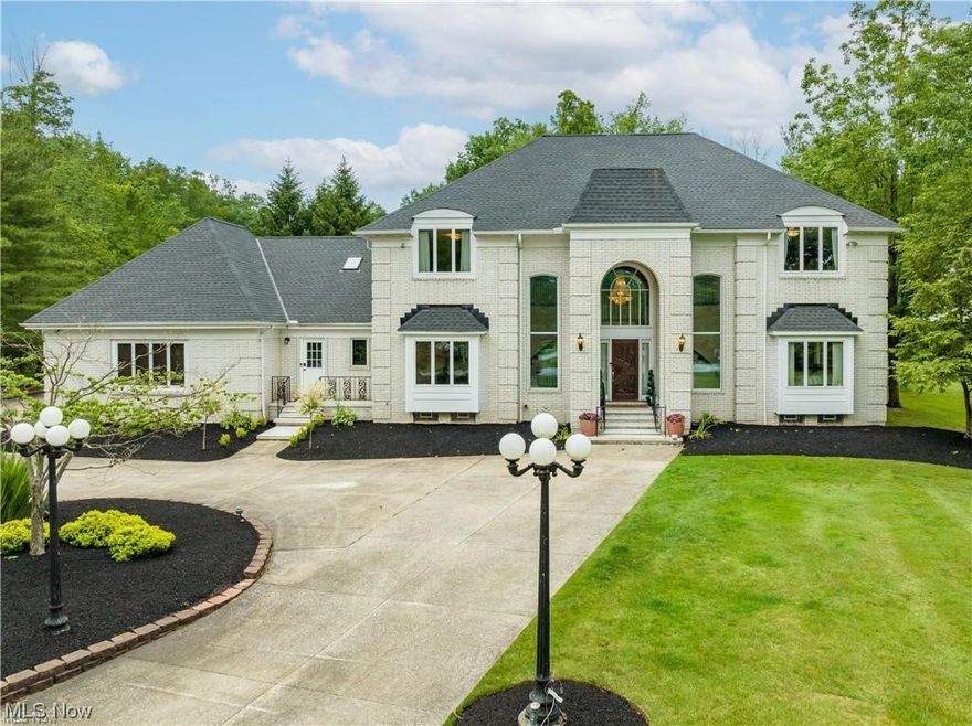 This recently remodeled residence boasts over 9000 square feet of finished space, offering a luxurious and spacious living environment. Situated in a peaceful cul-de-sac in the desirable Solon area, this home provides a private and tranquil retreat. Step inside to discover a grand foyer that welcomes you with its elegance and charm. The white kitchen, equipped with modern appliances and ample storage, is a chef's dream. The open-concept design flows seamlessly into the expansive two-story family room, creating the perfect space for entertaining and relaxation. The home features high ceilings throughout, enhancing the sense of openness and sophistication. The large bedrooms offer plenty of space for comfort and privacy, and the master suite is a true haven with its luxurious en-suite bathroom and walk-in closet. For entertainment enthusiasts, a sports bar awaits, providing the ideal spot to gather with friends and family. Unwind and rejuvenate in the inviting hot tub, offering relaxation and serenity after a long day. Outside, the property boasts a fully stocked pond, perfect for fishing enthusiasts or those seeking a peaceful waterfront experience. With 13 acres of land, there's ample space for outdoor activities and the opportunity to enjoy nature at its finest. Don't miss the chance to own this remarkable home in central Solon, offering a combination of luxury, tranquility, and modern living. Schedule a viewing today and make this exceptional property your own.