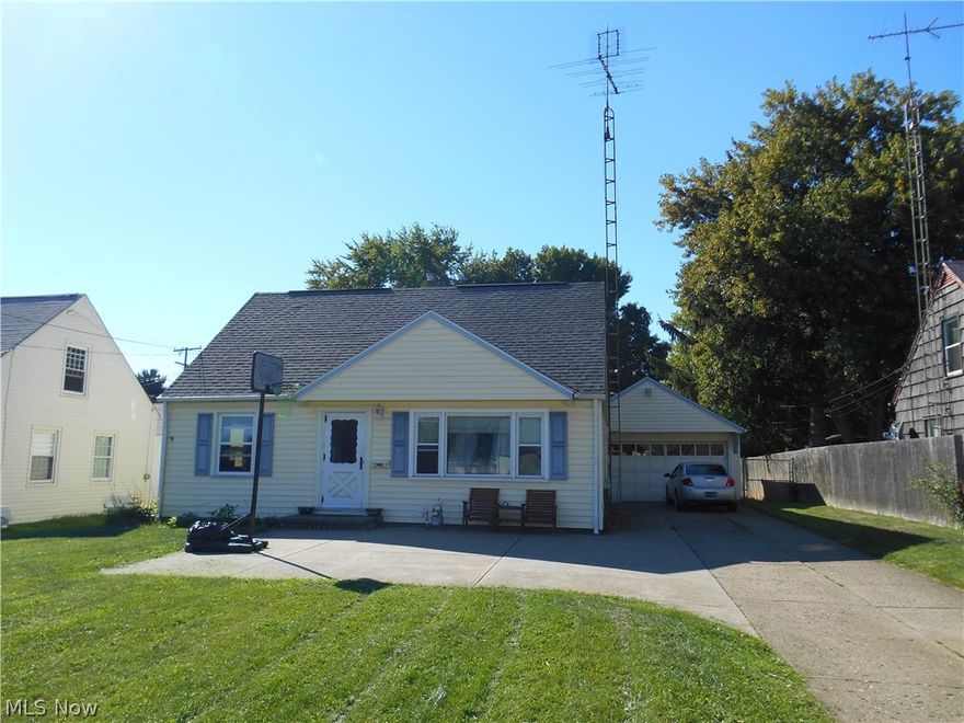Perry Twp. home featuring 4 or 5 bedrooms and 2 full bathrooms. The main level has an updated kitchen with plenty of cabinet and counter top space and an eating area, a large living room with brand new carpet, 2 bedrooms and a full bathroom. Upstairs has 3 more nice sized bedrooms with ample closet/storage space. There is a full basement with potential to be finished and another full bathroom. Other features include a brand new furnace, A/C, an enclosed 3 seasons room overlooking the fenced in back yard, a 2 car attached garage, cement driveway, a storage shed and more. This home is larger than it looks and is conveniently located close to schools, shopping, and restaurants.