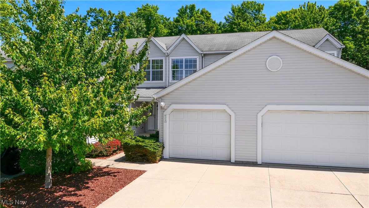 Welcome home to this stylish 2-bedroom, 2.5-bath townhouse cluster home perfectly situated in the sought after Hickory Ridge neighborhood. Built in 2004, this updated and move-in ready home is tucked into a desirable location that offers hard-to-find privacy on the back patio—perfect for relaxing or hosting guests. Step inside to discover the glow of beautiful hardwood floors stretching throughout the great room, kitchen and hallway. The spacious eat-in kitchen features stainless steel appliances and a modern, functional layout that flows effortlessly into the open living space. A convenient half bath is located on the main floor, with full baths upstairs and on the lower level. The second floor showcases warm hardwood floors in both the primary and guest bedrooms, while beautiful modern light fixtures add a touch of contemporary elegance throughout the home. Downstairs, brand-new carpet adds comfort to the versatile finished space—ideal for a recreation room, home office, gym or play area. You will also appreciate thoughtful storage solutions including under-stair storage and pull-down attic access. Enjoy the fabulous community amenities including a refreshing pool, clubhouse, picnic area, and courts for tennis or pickleball. Close to shopping, restaurants, medical care, and with easy highway and turnpike access, this home delivers on location and lifestyle. One-year home warranty included by Seller through America's Preferred. Just pack your bags and move right in! Don’t wait—schedule your showing today!