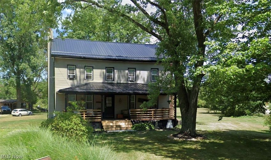 Welcome to this charming farmhouse built in 1850 and lovingly family owned for the last 40 years, perfectly situated on 4.67 acres at the corner of Lexington Road. This property offers a rare blend of character, space, and flexibility, featuring a three-bedroom, two full bathroom main home plus an additional secondary living space on the property. Step through the front door into a welcoming living room highlighted by a beautiful original brick fireplace with a wood beam mantel. The layout flows in a functional circular design, leading into a second family room ideal for additional living or entertaining space. The kitchen offers an open concept feel into the dining area and features custom-built cabinetry, first-floor laundry, and a full bathroom conveniently located just off the kitchen. Upstairs you will find three nicely sized bedrooms, a second full bathroom, and access to a walk-up attic for additional storage or future potential. The main home has seen many important updates, including a concrete sidewalk in 2023, front porch in 2023, electric panel in 2024, roof in 2021, granite countertops in 2020, new well pump, hot water tank, pressure tank, and water softener in 2022, a new back porch in 2022, updated carpet upstairs in 2022, first-floor carpet in 2024, and a furnace installed in 2015. Adding even more value, the back of the property includes a unique secondary living space that appears to be a shed from the outside but offers a functional interior with a living room open to the kitchen, an additional living area, a bathroom, and a bedroom, with the back porch recently converted to create the bedroom. This space has its own electric box and includes a composite toilet. A detached garage and additional shed provide even more storage and utility. This is a truly special opportunity offering acreage, charm, and multiple living spaces in one property. Come take a look and experience everything this rare listing has to offer.