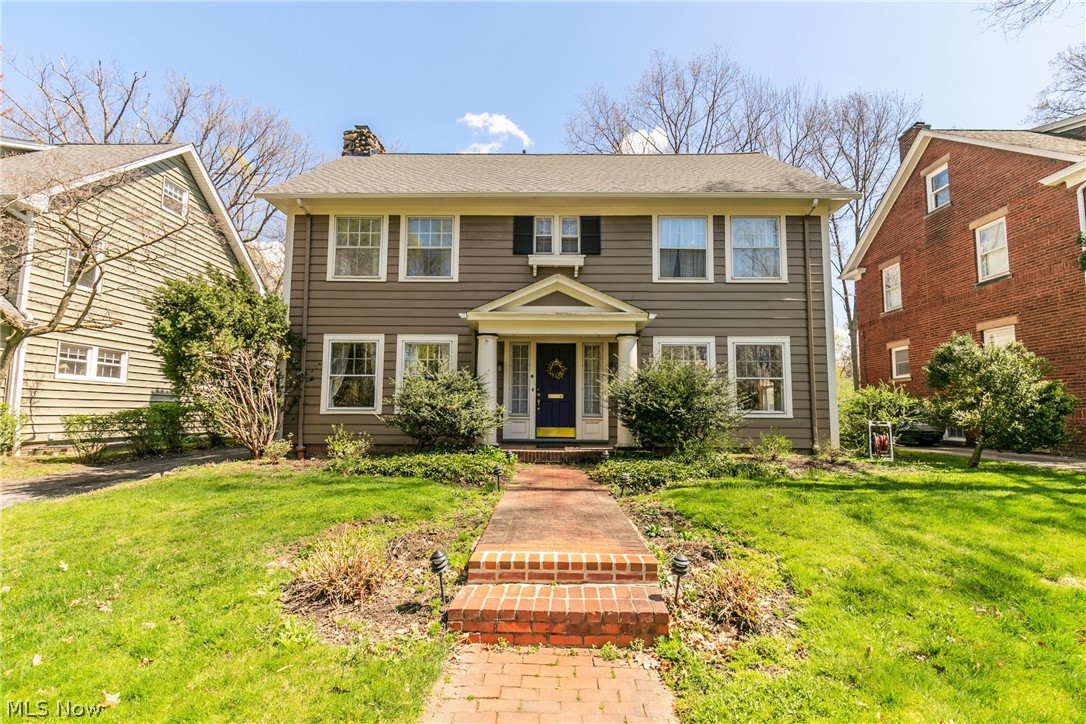 Welcome home to this beautiful & meticulously maintained Cleveland Height colonial. Original details are abundant throughout the house as well as key updates. Upon entering the home you are greeted by warm wood floors and original millwork. The generously sized living room features a large fireplace perfect to cozy up by on a cold winter night. The formal dining room is filled with light and offers plenty of room to host dinner parties or holiday gatherings. The updated kitchen features dark granite counters, a large island, stainless steel appliances, custom cabinetry, and a butler's pantry to maximize storage. There is also a powder room on this floor. On the 2nd floor, you will find 4 spacious bedrooms, an office, a sunroom, & 2 full baths. The master suite offers a private bath & access to one of the bedrooms that has been converted to a large walk-in closet. In the hallway, you will find a massive built-in linen cabinet to meet all of your storage needs. The 3rd floor offers a 5th