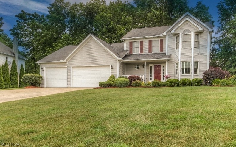 Pristine colonial on private cul-de-sac screams pride of ownership. Inviting front porch leads to wood-floored foyer, which opens to a formal living room and dining room that has a bay window and tray ceiling. Eat-in kitchen with a center island and granite counter is adjacent to a vaulted family room with fireplace. New slider off the kitchen dining area takes you to the massive deck overlooking the serene yard, which includes a heated pool, fire pit and shed. The second floor features the vaulted master suite with private bath, closet and attic access plus two additional bedrooms and another full bath. The lower level includes a rec room with gas fireplace and a utility area. There's an attached 3-car garage with tandem 4th bay and a workshop. All appliances stay, including the first floor washer and dryer. Convenient to rec center, parks, shopping, dining, I-480 and I-271. Excellent-rated Nordonia schools.