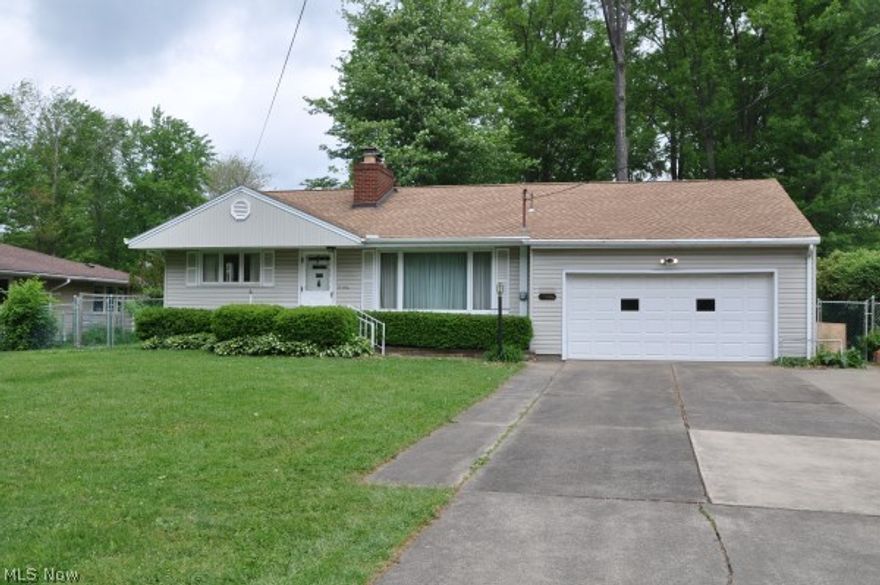 Lovely 3 bedroom, 1.5 bath ranch in Howland with 2 fireplaces, eat-in kitchen, enclosed sunroom, rec room in basement, beautiful big back yard, attached 2 car garage, concrete drive, newer furnace & water heater, new roof & vinyl siding, fenced yard & 2 storage sheds.