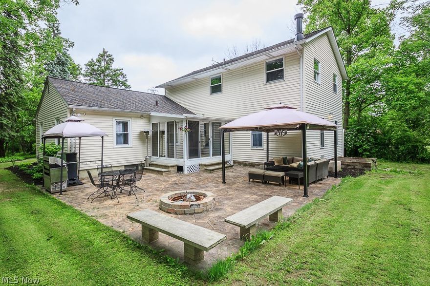 Welcome to this beautifully, updated colonial home in desirable Kirtland!!! This beauty offers 5 bedrooms, yep 5!  2.5 bathrooms, a partially finished basement, on a partially private three quarters of an acre lot! Enter through the foyer into the Dining Room and be prepared to gaze upon the home you've been waiting for!!  Main floor has a gorgeous updated large kitchen complete with new backsplashs and huge island, huge pantry PLUS new flooring, paint, and fixtures throughout!  Main floor also includes roomy family room and updated half bath with granite counters.  You'll want to check out the refinished hardwood floors in the 2 nice sized bedrooms.  Walk upstairs and you'll be amazed at the vastness of the master suite! The other two bedrooms are large too Plus if you desire a private office you can turn one into one!  Lower level offers a partially finished rec room, and plenty of storage space for all of lifes extras.   This semi private backyard boasts a new stamped concrete stamp