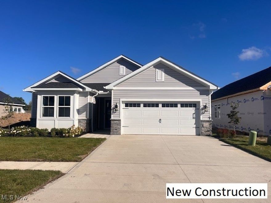The Portier floorplan is a multigenerational suite home that features three spacious bedrooms, three bathrooms with an open concept floor plan. Featuring the popular farmhouse, look the kitchen has open shelving with beautiful birch cabinets, double ovens and a large kitchen island with quartz countertops. The welcoming, great room features a vaulted ceiling and luxury vinyl plank flooring. The owner suite has dual vanities with quartz countertops, tile flooring, and a beautiful tiled shower with seating. The spacious garage has a 4 foot extension for storage.