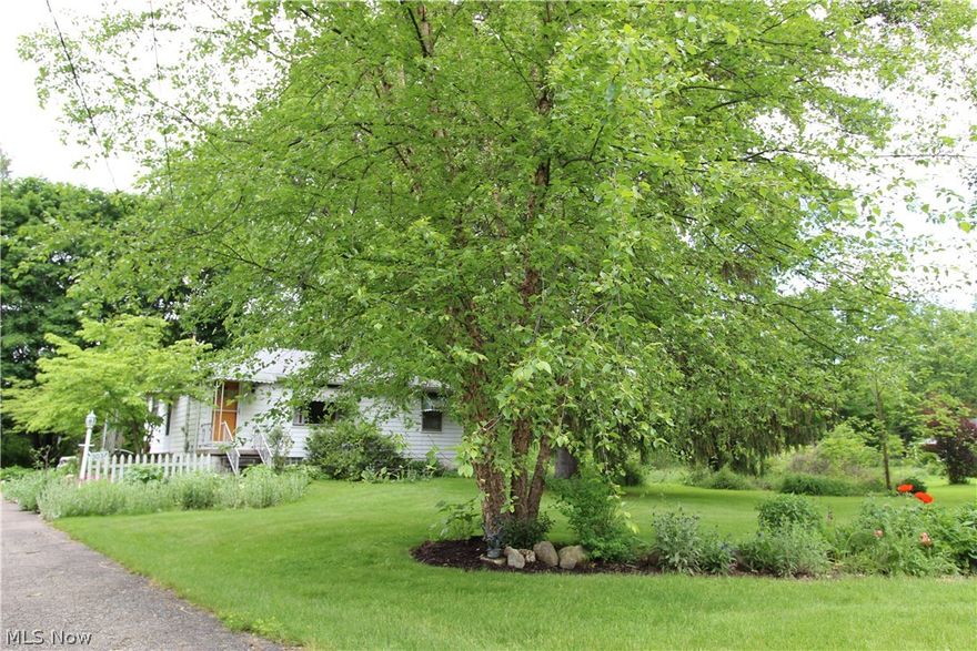 Clean and cute ranch on 1.1 acres of gorgeous landscaped land with tons of perennials*2 car garage with overhead storage*wood floors*roof new 2008*block windows 2006*furnace and air 2016*water softener 2009*pressure tank 2007*garage door 2011*