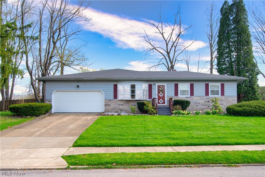 Welcome home to this fantastically well-kept and updated ranch home, located in a desirable community! Pride of ownership is apparent throughout, as you enter through the front door into the large living room, featuring hardwood floors and convenient built-ins. Make your way through the dining/flex area, featuring hardwood floors with a tasteful twist. From there, you'll find the spacious eat-in kitchen, featuring ceramic tile flooring, stainless steel appliances, plenty of great oak cabinetry, an abundance of counter space and a great pantry. The modernized kitchen opens up into a fantastic great room. Featuring a fireplace, window seat, and sliding doors overlooking the awesome backyard. Off the great room is the dreamy master suite - featuring an oversized bedroom, large walk-in closet, and full bathroom. On the other end of the house, you'll find three additional large bedrooms, each featuring great hardwood floors and plenty of closet space, and the updated full bathroom, featurin