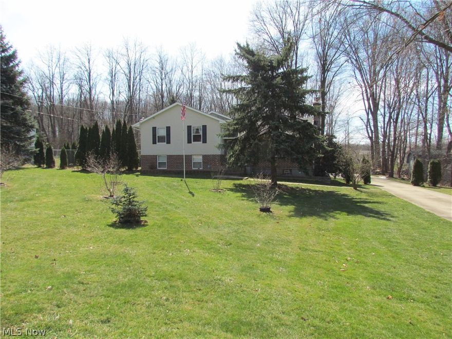 Much larger than photos portray, with over 2300 square feet living space. Four bedrooms, two full bathrooms, formal living room, family room, spacious rec. room with walk-out patio on second floor, and partially finished basement with bar. Large eat-in kitchen with abundant cabinets and counter space. Appliances stay! Two car attached garage, concrete drive with extra space for parking, fenced in backyard with beautiful patio for entertaining, and oversized storage shed, garden and fruit trees.  Did I mention Tallmadge Schools? Home is near lots of shopping and great restaurants, everything within 5 minutes! WOW! The Historic Tallmadge Circle awaits, call us today for a private tour!