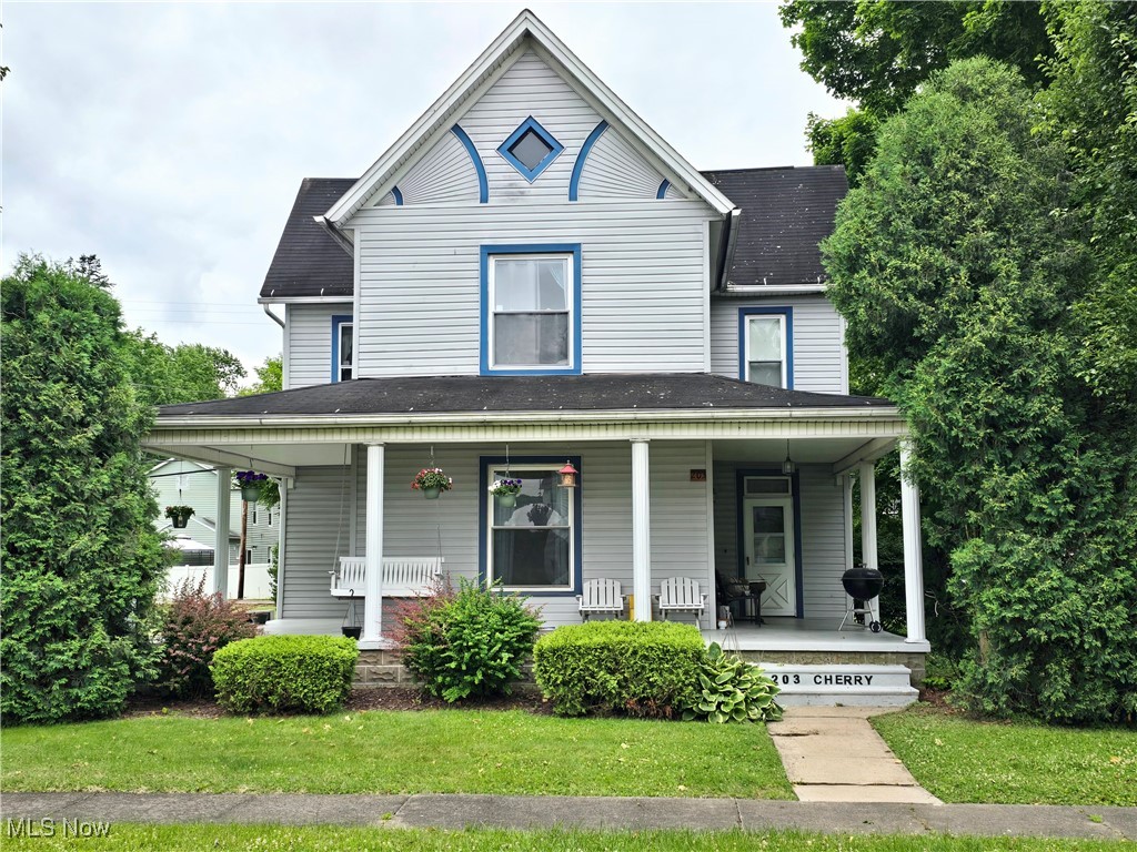 Great opportunity for your large country style home with the conveniences of quaint village living. Five bedrooms up and the two full baths are on the main floor. The original kitchen is mostly intact, and has been used as combo summer kitchen and laundry room. The second kitchen was installed in early 1990's leaving many original features intact. The two full baths are on main floor. Rooms are large with original oak woodwork throughout as well as hardwood flooring. Kitchen has laminate as does summer kitchen. Formal dining room off of kitchen and large family room is situated facing Cherry Street (North). Pocket doors from dining room to living room and many original built-in throughout the main floor. Newer furnace and A/C, newer roof. Detached two car garage with workspace. More pictures to follow!