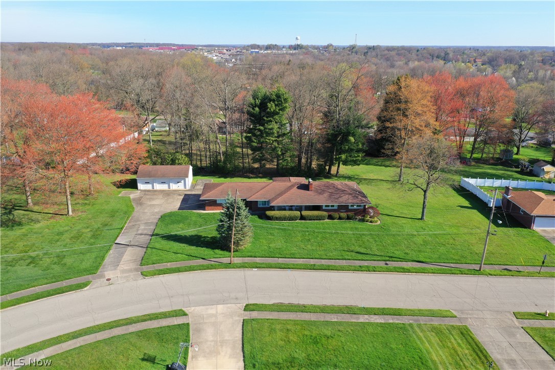 AWESOME 3 Bedroom BRICK Ranch with whole house generator, 2 Car Attached Garage (handicap accessible), 3 Car Detached Garage on 1.6 Acres of Land. Home Features Include: PHENOMONAL Front Living Room with Fireplace, Large CUSTOM Kitchen with Granite Countertops, Stainless Steel Appliances, Pantry, & Breakfast Area, 3 Large Bedrooms, UPDATED Handicap Bathroom with Walk in Shower, Elevator to Rec. Room Area, First Floor Office, Half Bath & First Floor Laundry Room. The Lower Level offers a HUGE Rec. Room Area with Fireplace & Shop/Man Cave Area. There is a Covered Back Patio which leads to a Private, Scenic Backyard. There are hardwood floors under all carpet areas.