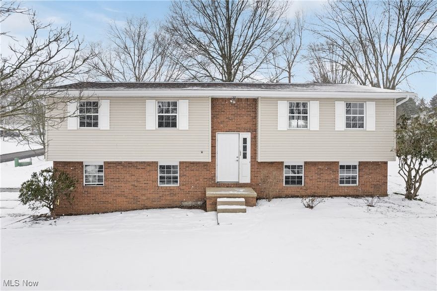 This beautifully remodeled Canal Fulton home is ready for its new owners! Featuring 3 spacious bedrooms, 1.5 baths and loads of major updates - all that is left to do is move right in and enjoy! As you enter, you’ll be captivated by the new vinyl plank flooring throughout, and thoughtful updates that create a perfect mix of comfort and style! The heart of this home is the updated open-concept kitchen and dining area. The kitchen features brand-new, stainless-steel appliances, granite countertops, and custom soft close cabinetry!! Adjacent to the kitchen and dining area, the living room offers a bright, airy space with plenty of natural light. Its open layout connects effortlessly to the rest of the home! Just down the hall you'll find 3 generously sized bedrooms, all of which have ample closet space. The main bathroom has been completely remodeled with contemporary design elements, including a custom double sink vanity, sleek tile work, and premium fixtures! The finished lower level provides even more space. A large living room, perfect for entertaining! The utility room provides ample storage, or a space that you can create a home gym or rec room! The possibilities are endless! The oversized two car garage and two-tier deck are added bonuses to this amazing property! Located in the highly desirable Spring Valley Allotment, this beautiful home is just minutes from local schools, parks, shopping, dining, and more. Offering a tranquil setting with convenient access to everything you need! Call today to schedule a tour and see all this home has to offer! Major updates in 2024/2025 include brand new furnace, AC, hot water tank, electrical panel and electric throughout, plumbing, gutters, soffits,  all new interior doors, trim flooring and more! Agent owned.