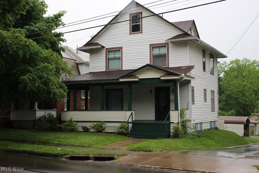 A step back in time with this 5 bedroom and 1.5 bath home. Large wrap around porch. Original woodwork and beautiful hardwood floors. Formal dining room with built-ins. Large living room and den and also 1 st floor laundry. The basement walks out to a large city lot. Many recent updates to this great home include; roof shingles 2009, Furnace 2011, A/C 2000. Complete renovation 1994. All newer wiring and plumbing.