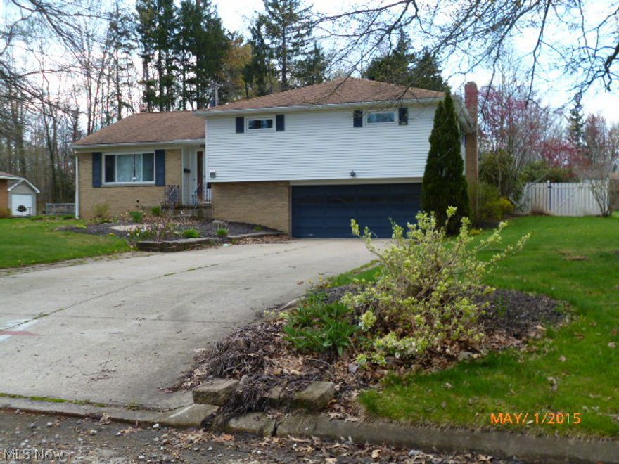 This home has tremendous possibilities and is located  in a desirable Alliance neighborhood.  Hardwood floors, the updated kitchen has a lot of storage and work space.  Bedrooms are very roomy.  The inground pool has a diving board and sliding board  - there is a pool house out back also.  What an opportunity to own the home of your dreams! This property is sold 'as is'.