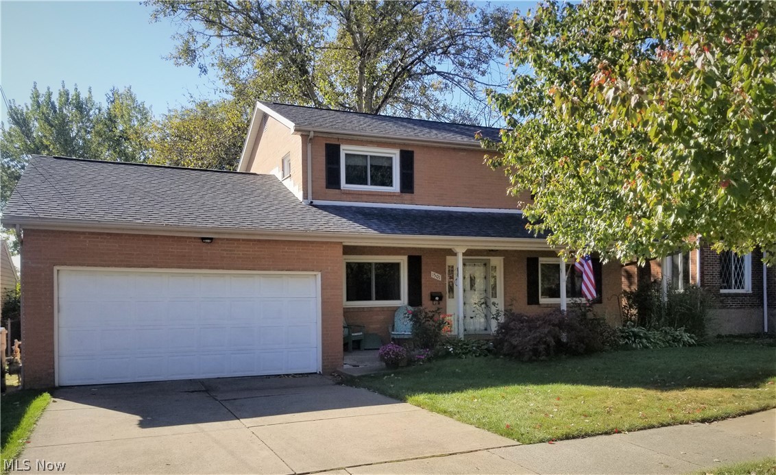 This is a newer brick colonial in the eclectic South Hills area of Old Brooklyn. Just minutes from Downtown, Ohio City and Tremont entertainment districts but maintaining a walkable suburban vibe. The first floor has been updated with wood flooring and a neutral color palette. The living room is large and sunlit, with an adjacent office and main floor full bath with shower. The formal dining room connects to the large kitchen with tons of maple cabinets and stainless fridge and dishwasher. There is a first floor laundry room with washer/dryer and lots of storage. The two car attached garage includes a large workshop area and the work bench will stay. Upstairs there are 4 carpeted bedrooms and another full bath with a tub. New roof, less than 1 year old. The front yard is nicely landscaped with a porch stretching the length of the house. The back yard is large and fenced with old growth trees and a brick path to a basketball court. This home is family ready.
