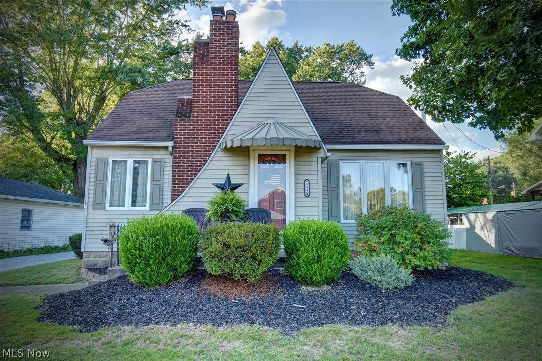 You will love this adorable 3 bedroom home in Sandyville! Home features living room w/ gas fireplace, open kitchen/dining room, first floor bedroom and full bath. Upstairs has two more bedrooms. Basement is neat and clean with additional finished living space, laundry area and commode. Outside you will find two detached garages great for parking or storage. Come check out this nice affordable property!
