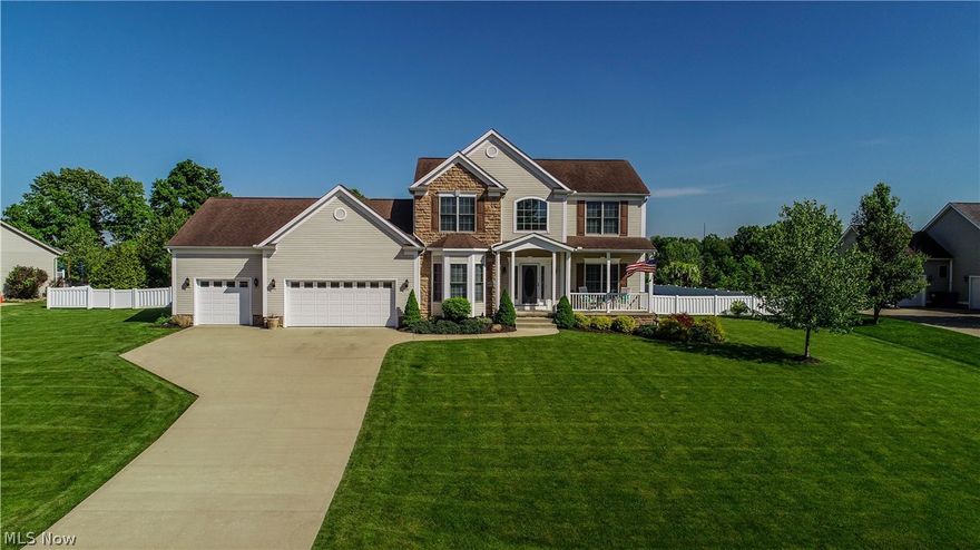 Nearly an acre (.913) of Country Living in King Ridge - Brimfield Twp. - 3 Bedroom, 3.5 Bath features 9 Ft. Ceilings on 1st Floor, Classic White Woodwork throughout, Open 2-Story Foyer, Large Bayed Eat-In Kitchen w/Center Island, Stainless Appliances, Pantry & Ceramic Tile. Family Rm. w/Gas Fireplace & Cathedral Ceiling w/Fan. Formal Living Rm., Dining Rm. w/Tray Ceiling & Recessed Lighting, Bayed Office, Half Bath & Laundry complete 1st Floor. Spacious Master Bedroom w/Cathedral Ceiling opens to Master Bath w/Walk-In Closet, Plant Ledge & Garden Tub. Two additional Bedrooms & Full-Bath round out 2nd Floor. Possible Guest Suite in Lower Level, which features Separate Entrance up to Garage; an additional Bedroom w/Walk-In Closet & Full-Bath. Large Rec Room features recessed lighting & (2) Lighted Storage Closets.  Additional Storage in 21 X 12 Utility Area.  Kitchen Opens to 27 X 15 Two-Tiered Fiberon Deck overlooking 30 ft. Heated Pool, 8 X 12 Storage Barn & Vinyl Fenced Yard w/Invisible Pet Fence System.  Enjoy gatherings on 43 X 19 Patio leading to private built-in Fire Pit. The 3.5+ Heated Garage features 12 ft. Ceiling, Hot & Cold Water, Electric, Ceiling Fan, Cut-Glass Bay Doors, Rear Man Door, added Windows & Lighted Overhead Storage!