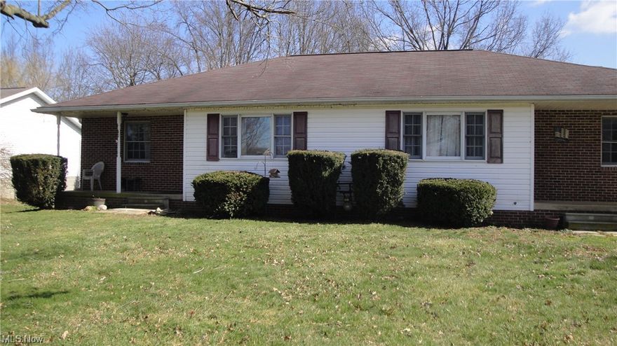 Ranch is a duplex with one side rented for $700. Other side is empty. They are putting in new toliets & carpet is new on empty side.  Garages are at bottom level.