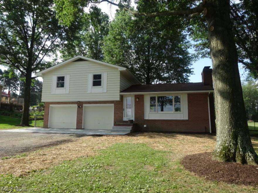 Welcome home to this beautifully remodeled split level with two full baths and large fenced lot. Home offers new windows, new furnace, new kitchen and new baths. Most of the flooring is new as well as light fixtures, plumbing and new paint both inside and out. Home offers lots of natural light and a beautiful sun room with vaulted ceilings. All you need to do is move in!