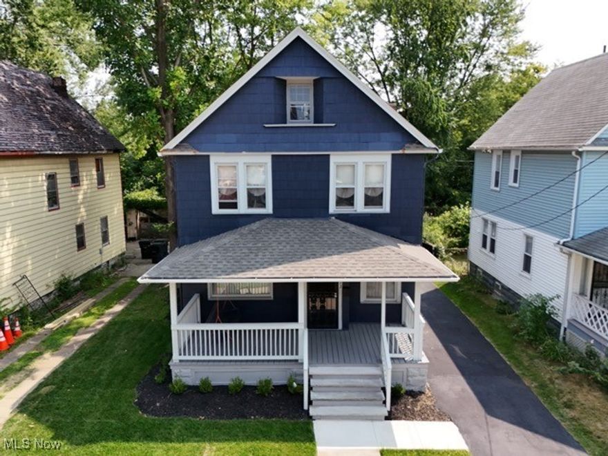 Beautifully renovated home located in the heart of Cleveland, Ohio. This stunning property boasts a fresh and modern feel with numerous updates throughout, making it the perfect place to call home.  New Roof: Enjoy peace of mind with a brand-new roof, ensuring years of protection and durability. Fresh Exterior Paint: The home features a fresh coat of exterior paint, enhancing its curb appeal.  Step into the living and dining rooms, where beautifully refinished hardwood floors add warmth and character to the space. The kitchen has been completely remodeled with new cabinets, countertops, and stainless steel appliances.  All new windows have been installed, allowing natural light to flood the home while improving energy efficiency.  The bedrooms and other living areas feature new, plush carpeting, providing comfort and style. Enjoy the luxury of newly remodeled bathrooms, complete with modern fixtures and finishes.