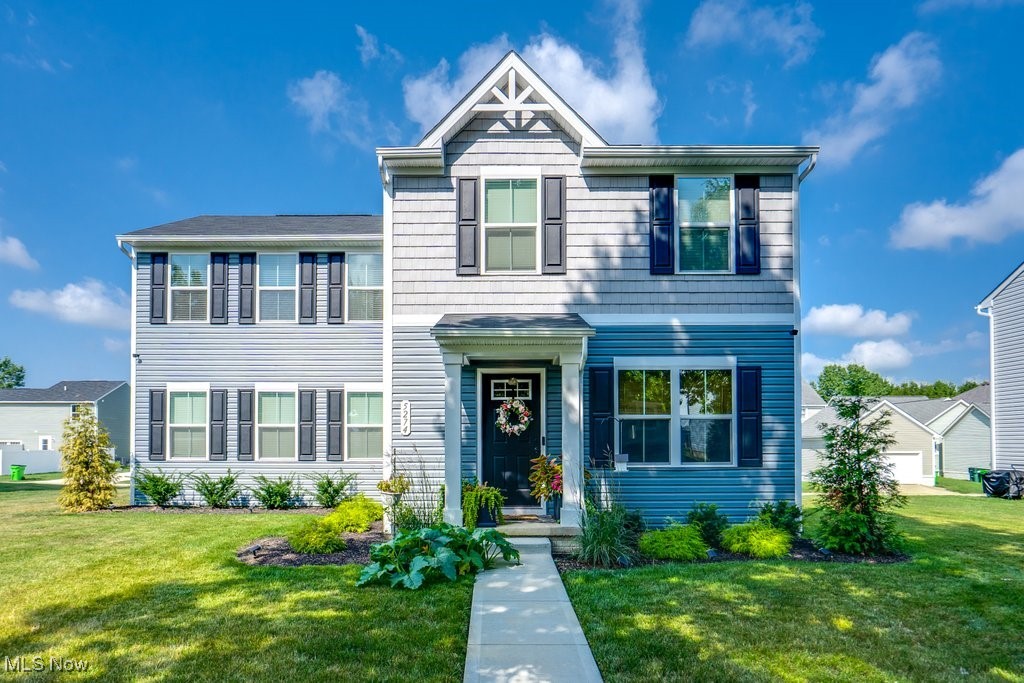 New Construction Vibes—Without the Wait!
Welcome to 5274 Miller St, a stylish and spacious colonial offering the appeal and layout of new construction—plus the bonus of mature landscaping and no builder delays. This 4-bedroom, 2.5-bath home features over 1,650 sq. ft. of thoughtfully designed living space, along with a full, unfinished basement boasting high ceilings and a full bath rough-in—ready to transform into a home gym, theater, rec room, or all of the above.
Step inside to find durable, on-trend luxury vinyl plank flooring throughout the open-concept main level—perfect for easy cleanup and elevated everyday living. The center island kitchen is a chef’s dream, complete with quartz countertops, stainless steel appliances, a pantry, and ample space for meal prep and casual conversation. The living and dining areas flow seamlessly into the kitchen, with a convenient half bath just off the living room.
Upstairs, the owner’s suite offers a true retreat with a walk-in closet and private en suite bath. Three additional bedrooms share a full hall bath, and the second-floor laundry means no more hauling baskets up and down stairs.
Just home also comes with a 50% tax abatement through 2029. With the benefits of newer construction, energy efficiency, and plenty of room to grow, this move-in ready home is ideal whether you’re upsizing, relocating, or planting long-term roots. Don’t wait—schedule your showing today!