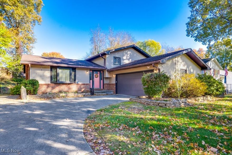 Welcome to this well maintained spacious home in Green Local school district! You'll find plenty of room for everyone with 3 bedrooms upstairs and one on the lower level! Renovated kitchen featuring granite countertops, bathrooms, and flooring make this home an easy move in! Unlike many split levels, this one has a true basement with ample storage and utility space. Outside you will find large walk out patio and even an attached enclosed sun room! This home is ready for you to enjoy this cozy fall and winter season!