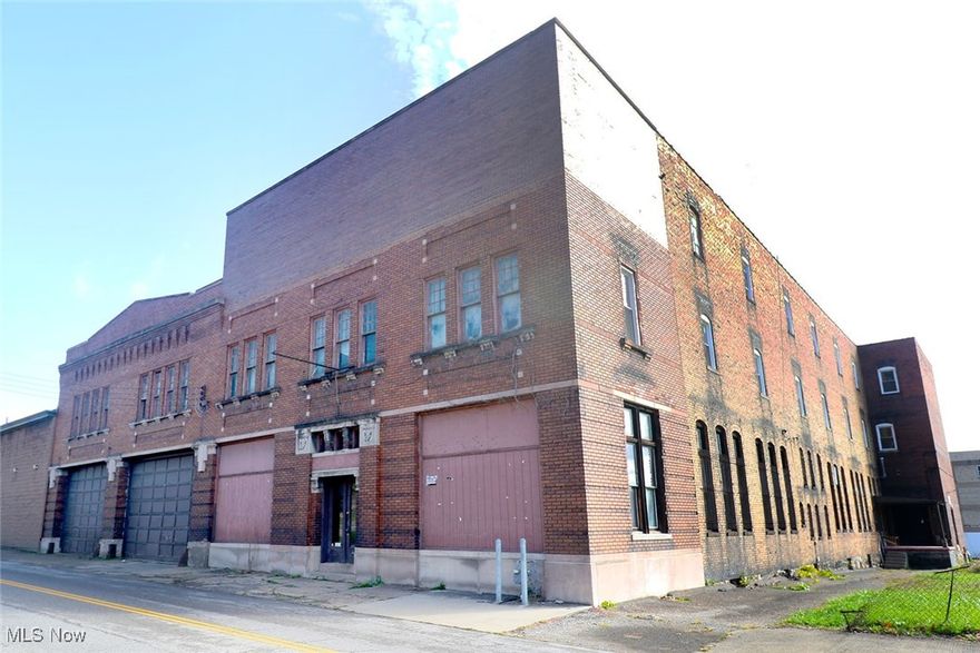 An exceptional opportunity to lease or purchase a substantial 46,000 square foot (plus full basement) commercial property located in downtown Steubenville, perfectly designed for distribution, light manufacturing, or high-volume storage. This property blends heavy-duty operational capacity with professional administrative space and offers easy access to State Routes 7 and 22, as well as the bridge connecting to West Virginia.

The expansive warehouse space spans three levels plus a full basement offering extra storage space, providing immense flexibility for various business operations. Unique to the space are the robust hardwood floors, which provide an incredibly durable and stable surface ideal for heavy loads and high-traffic flow. Streamline your logistics with a large freight elevator connecting the first, second, and third floors, ensuring easy movement of inventory and equipment between levels.

The facility features three large garage doors, including one specifically designed to accommodate full-size semi-trucks, providing optimal dock access and efficient, weather-protected loading/unloading. For professional amenities, the property includes a separate, designated office and lobby area perfect for customer reception, administrative work, and meetings, alongside three ample restroom facilities to support staff and office personnel.

This property is ready to support high-demand operations and offers a rare combination of heavy-duty industrial features and professional office convenience in a highly accessible location.