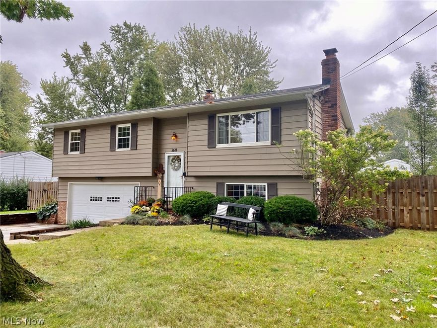 Meticulously cared for and fully updated 3 bedroom, 1.5 bath home with 2 car garage. It has an updated kitchen with granite counter tops, off white cabinets and adjacent dining area. Walk out to a large deck from the dining room overlooking the newly fenced in backyard with pool. The large, inviting living room has plenty of natural light. Three  bedrooms and one full bath complete the first floor. The lower level has a large family room with cozy gas fireplace, ½ bath and entrance to the 2 car attached garage. Some updates include new flooring, new paint, new fencing, new pool, new carpet, updated full bath and so many more updates.