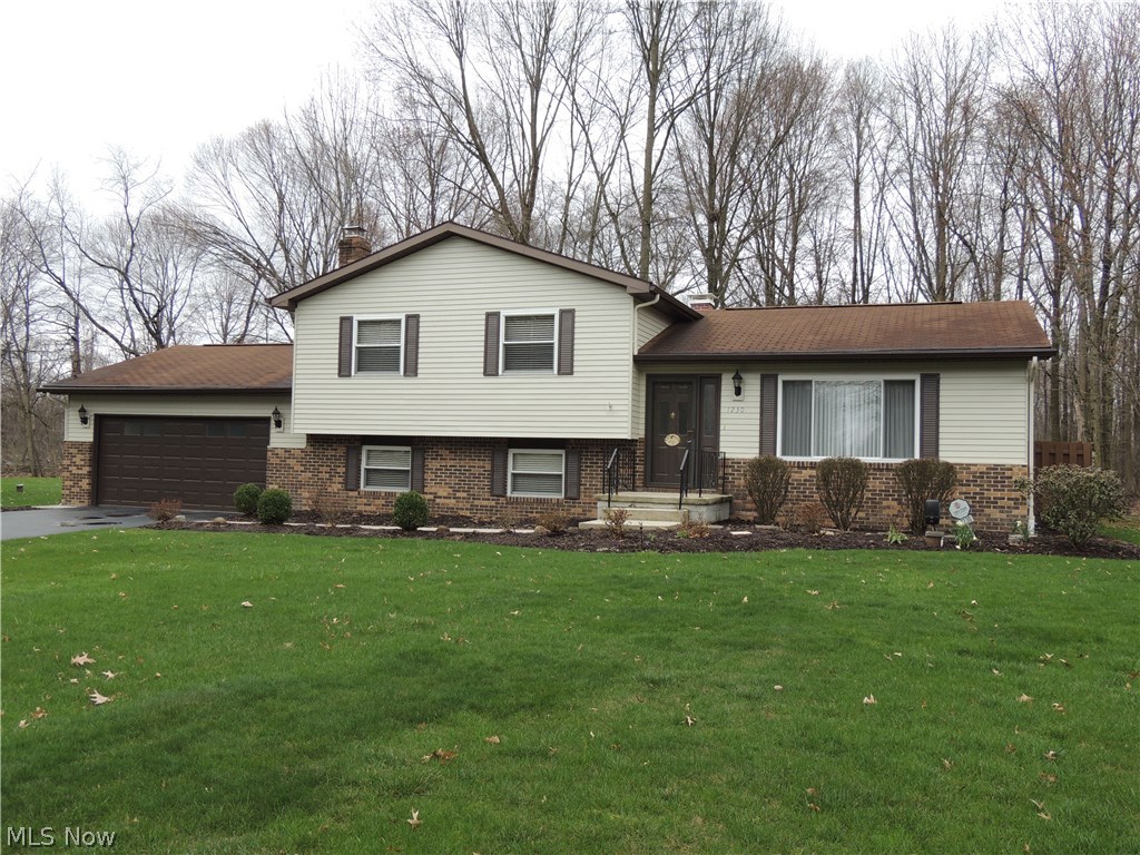 Welcome to this well maintained home ready for its new owners. Updated vinyl windows. Spacious living room with fireplace. Formal Dining Room with french doors that open to deck. Fenced big backyard perfect for pets and relaxing on a sunny day. There is also a shed for storing extras. Kitchen has eat-in area and comes equipped with stainless appliances. Master bedroom has 2 big closets with updated shelving and updated (approx 1 1/2 years ago ) master bathroom with walk-in shower. Hall bathroom has also been updated with new tub, surround, vanity, flooring, heated light and floor. Nice size 2 and 3rd bedroom have deep closets. All bedrooms have ceiling fans. Large family room with plenty of room to spread out has wood burning brick fireplace with a wood mantle. Office or possible 4th bedroom in lower level. 1/2 bath. Access to garage from lower level. Garage has several storage cabinets that will stay. Basement has painted floor. Washer and dryer will stay. 2 sump pumps and backup ba