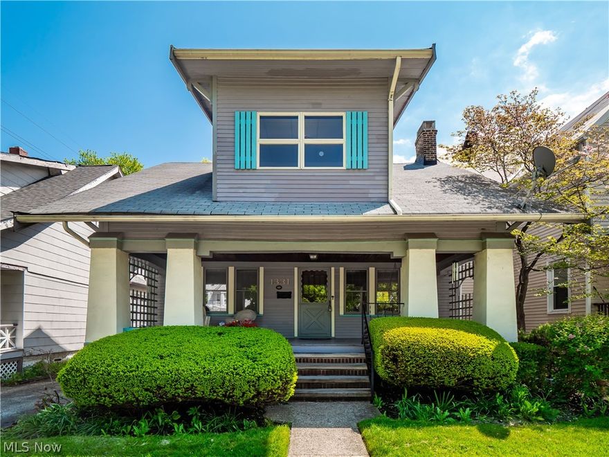 Opportunity knocks! Don’t miss this charming “Historic Lakewood” home ideally situated in a prime location nearby everyday conveniences. An enchanting front porch complete with a classic porch swing warmly welcomes you as you approach the home and enter through the stately original front door.  Inside the spacious living room showcases hardwood floors, a cozy fireplace, and timeless character that flows into the large formal dining room. Here, a stunning one-of-a-kind built-in cabinet is beautifully framed by original leaded glass windows, creating a true focal point filled with historic charm.  Privately tucked away at the rear of the home, the kitchen offers excellent potential and awaits your personal vision and finishing touches. Upstairs, hardwood floors continue throughout two generously sized bedrooms, along with a light-filled tandem bonus room flanked by two walk-in storage closets. This flexible space is ideal for a home office, nursery, dressing room, reading retreat, or expanded closet space. The full bathroom features a walk-in shower and abundant built-in storage. The unfinished basement provides plentiful storage space, a laundry area with washer and dryer included, updated mechanicals (furnace & A/C 2020, hot water tank 2025), updated electrical, and an additional full bathroom with shower stall.  Step outside to discover a quaint, fully-enclosed, landscaped backyard oasis.  It's the perfect setting for morning coffee, gardening, entertaining, or quiet evenings outdoors, plus convenient access to the detached garage. Don't miss this opportunity to own a truly unique Lakewood home!