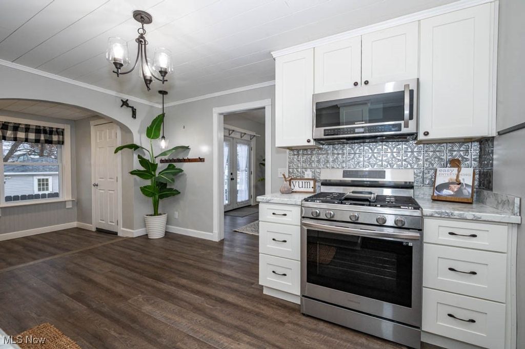 Photo of 157 E Ohio Avenue, Sebring, OH 44672 (MLS # 5176768)