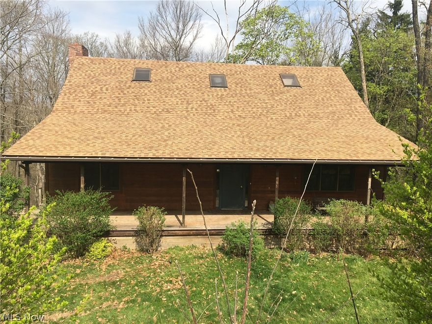 City living with a country feel.  Cedar sided 2 story home looking for it's new owner.  Front & rear decks.  Main level bedroom, full bathroom, large eat-in kitchen, dining room, living room & family room.  Upstairs are 3 bedrooms & full bathroom.  Spacious unfinished basement with door to outside.