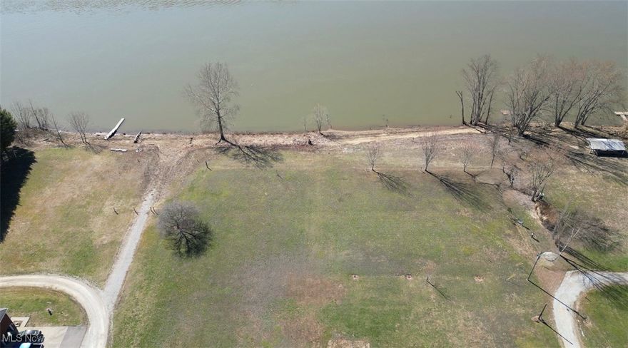 Looking for your own river front oasis? Check out this FLAT well maintained river lot located on the Ohio River in Sardis. Equipped with water and electric hook ups for 5 RVS this makes the perfect spot for your summer recreation destination. Whether you're looking to boat and fish and enjoy the peaceful setting or hosting a party for all of your family and friends this will be the perfect location. Easy access to walk down to the river and a clean shore ready to fish! Build your dream home on the top lot with an unobstructed view of the river and WV hills. Whatever your needs - they aren't making land like this anymore! Grab it before it's gone!