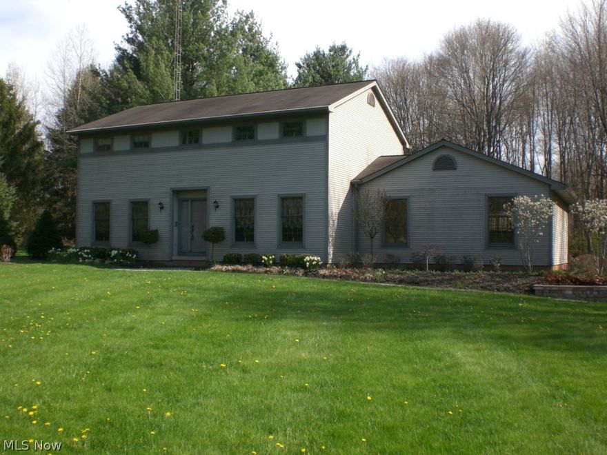 Great colonial saltbox style home on 2.47 acres. Quality construction with oak trim, solid oak doors and custom oak cabinets as well as 5/8" drywall. Geothermal heat with very low utilities. Kitchen has stainless steel appliances,large dining area over looks 20x18 deck and inground pool with new liner, first floor laundry.
Fourth bedroom on first floor has adjoining bath and could be office or den/library. There is a attached 2 car garage as well as a 3 car detached. Seller is retaining mineral rights.