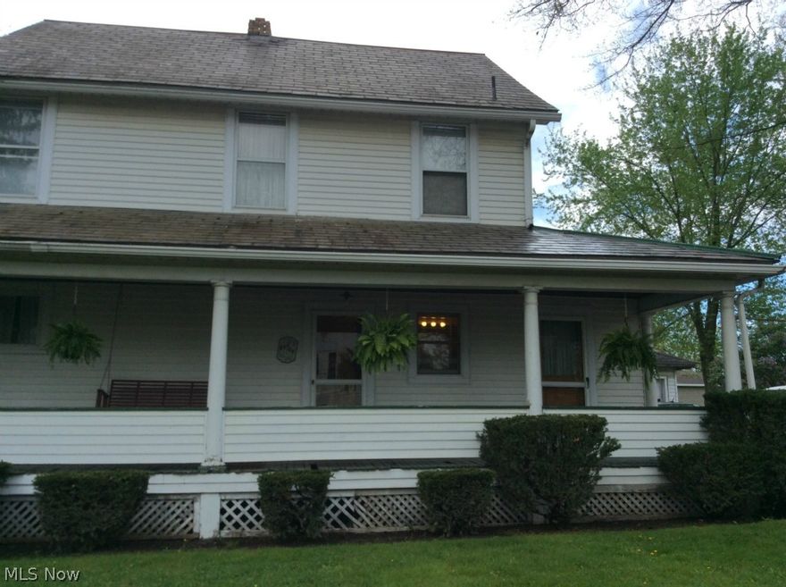 Investors and Buyers must see this large corner property in Lisbon. 2 story with L-Shaped porch has charm and upgrades on the inside. Plenty of room for the children and adults to play and entertain.