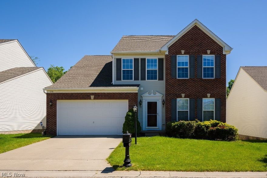 Pretty and move in ready transitional home with brick front and fenced backyard. This open floor plan has wood flooring throughout the foyer, kitchen and morning room. The spacious great room features a gas fireplace and walls of windows and opens to the kitchen with great cabinet space and a center island. There is a living room/office as well a morning room perfect for sun room or breakfast room. The master suite features a walk in closet, full bath including double vanities, soaking tub and separate shower. Three additional bedrooms and two full baths are on the second floor.  Great for entertaining is the finished lower level with recreation room, fitness area and plenty of storage.  The awesome oversized deck overlooks the fenced in backyard, walking path and preserve area.