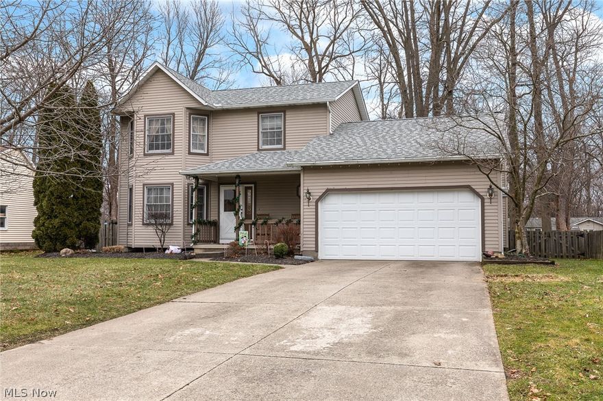 Amazing Colonial featuring 3 bedrooms and 2 1/2 baths.  This home is nestled in very popular subdivision and has a park-like backyard.  Updated kitchen with stainless appliances and newer granite countertops has an attached eating area.  Family room with laminate floors and gas fireplace.  Living room with amazing wood floors.  Formal dining room.  Master bedroom with attached full bath.  Full basement.  Backyard patio.  Two car attached garage. A must see!