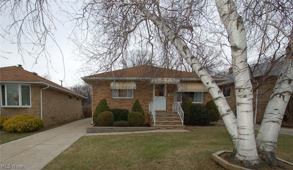Welcome home to 2806 Norris Avenue! Move into this solid all-brick ranch situated on a 282 foot double-deep lot. Looking for a home without carpet? This home boasts beautiful hardwood floors in the living room, dining room, hall and all 3 bedrooms. The dining room features a built in china cabinet and kitchen features an eat-in dinette area. Owner's bedroom features a large half bathroom. Basement features a recreation area, workshop area and laundry area with lots of storage. Basement also has glass block windows and house features newer vinyl replacement windows. Property features a 2 plus car garage, covered concrete patio in the rear, park like setting on rear parcel. Great location on a dead-end street. Call today for your private showing!
